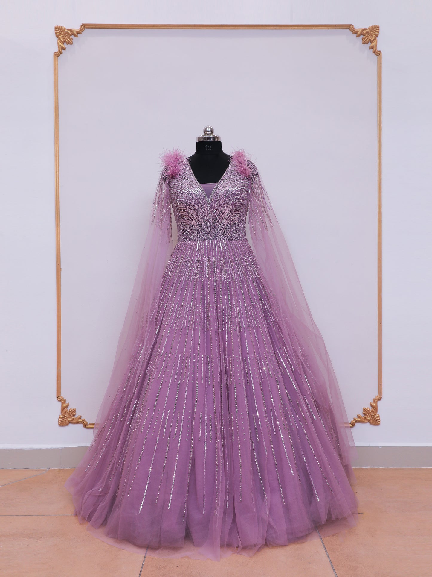 Lilac Handwork Designer Bridal Gown with Feather On Shoulders.