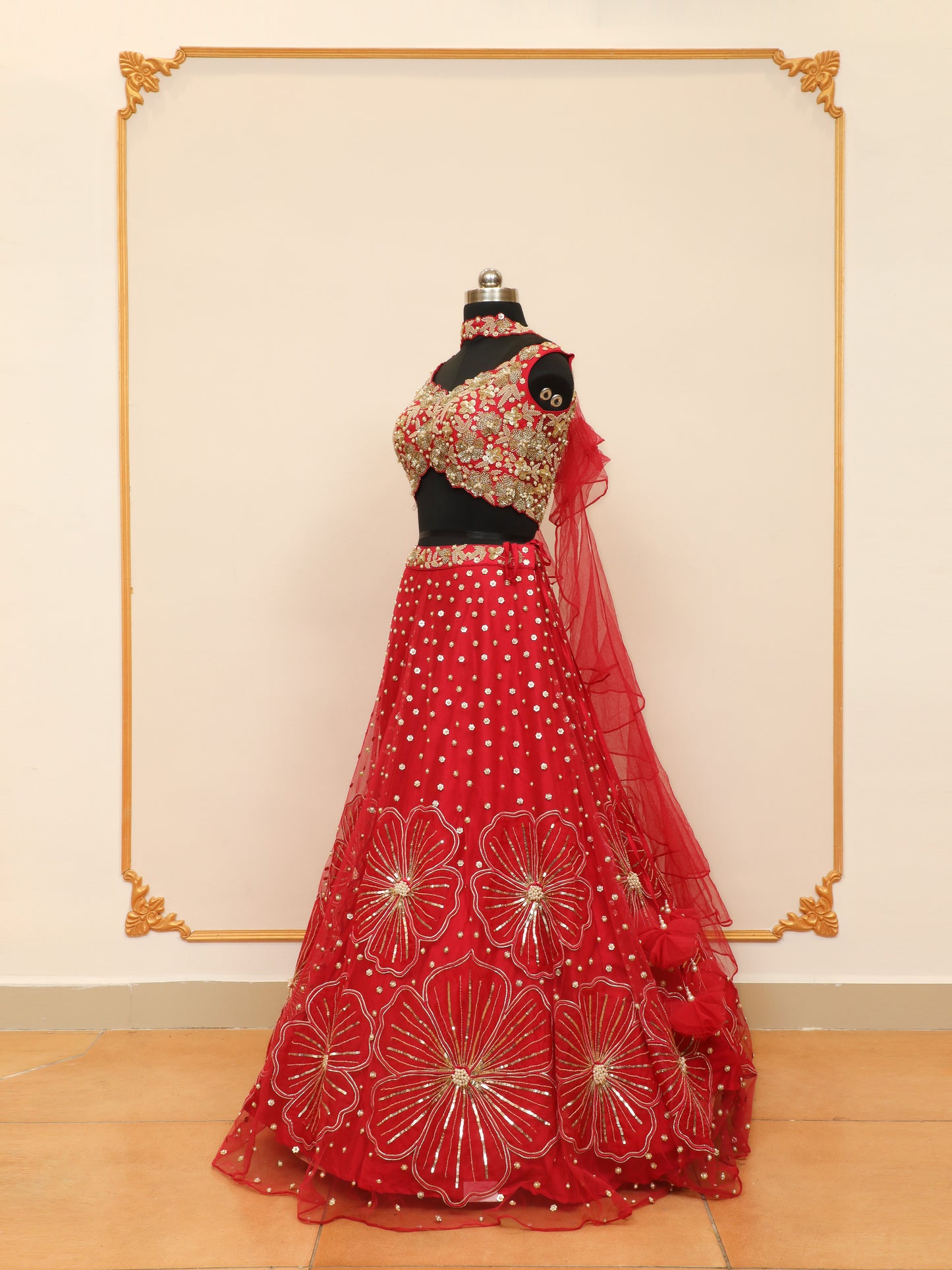 Rani Designer Lehenga for Bridesmaid with Designer cut blouse and lehenga with multiple big florals.